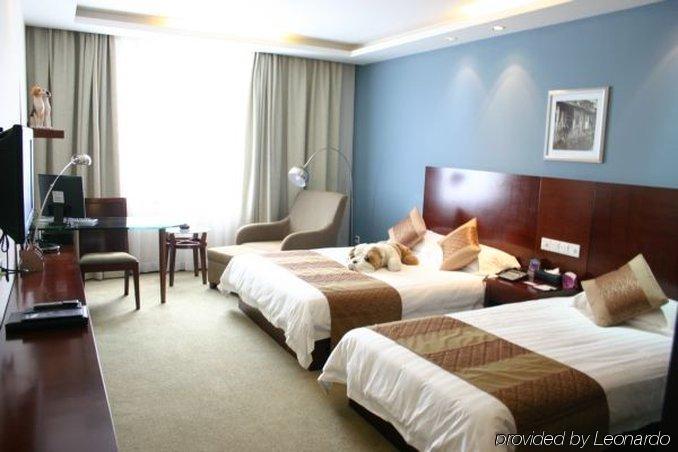 Suzhou Taoyuan International Holiday Hotel Habitación foto